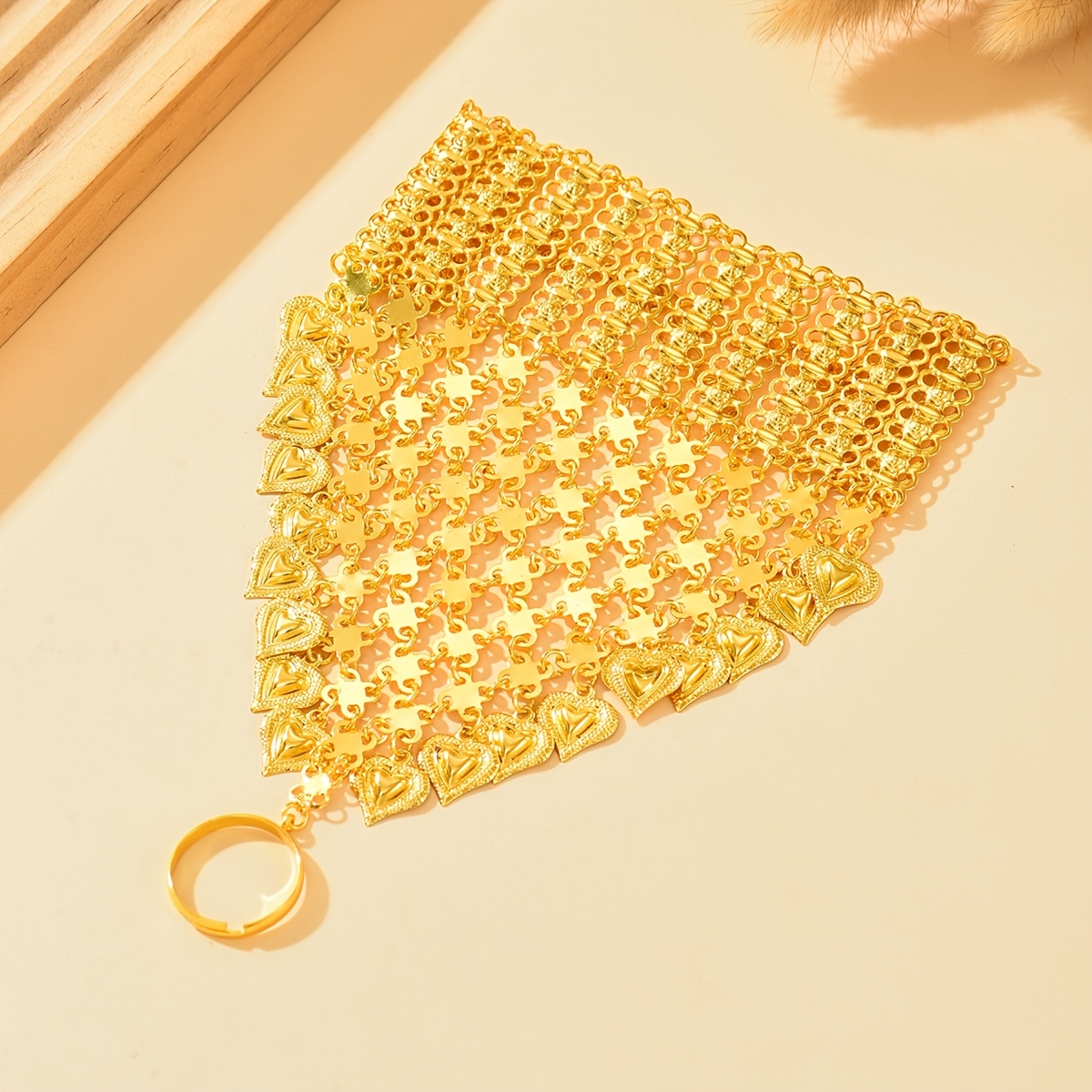 Heart-Shaped Tassel Ethnic Bracelet with Golden Detailing